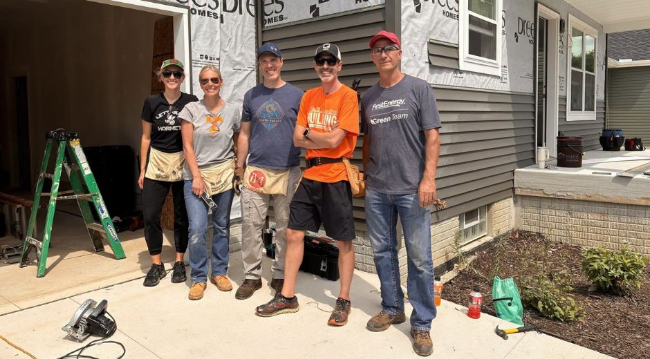Employee volunteers with Habitat for Humanity